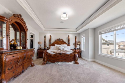 125 Kinniburgh Loop, Chestermere, AB - Indoor Photo Showing Bedroom
