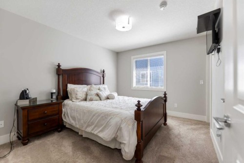 125 Kinniburgh Loop, Chestermere, AB - Indoor Photo Showing Bedroom
