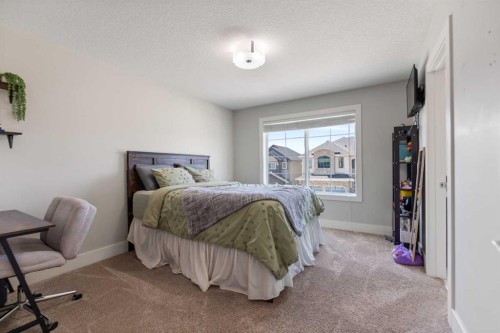 125 Kinniburgh Loop, Chestermere, AB - Indoor Photo Showing Bedroom