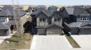 125 Kinniburgh Loop, Chestermere, AB  - Outdoor With Facade 