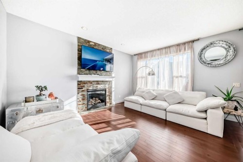 153 Chaparral Valley Mews, Calgary, AB - Indoor Photo Showing Living Room With Fireplace