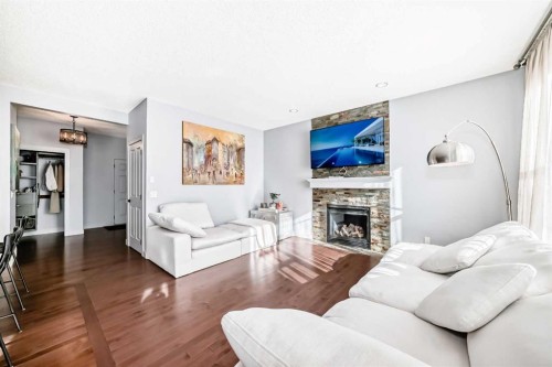 153 Chaparral Valley Mews, Calgary, AB - Indoor Photo Showing Living Room With Fireplace