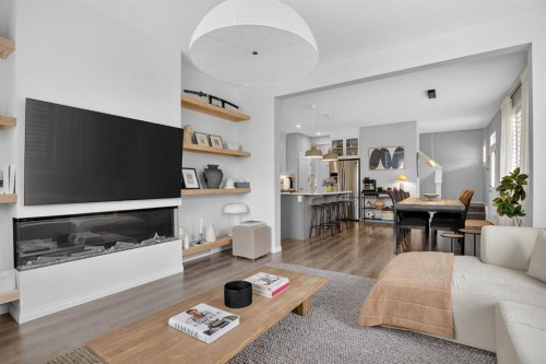 20 Carrington Circle Nw, Calgary, AB - Indoor Photo Showing Living Room With Fireplace