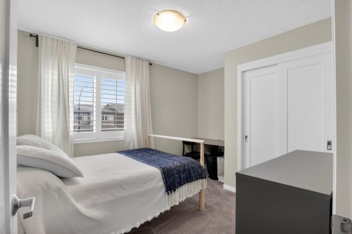 20 Carrington Circle Nw, Calgary, AB - Indoor Photo Showing Bedroom