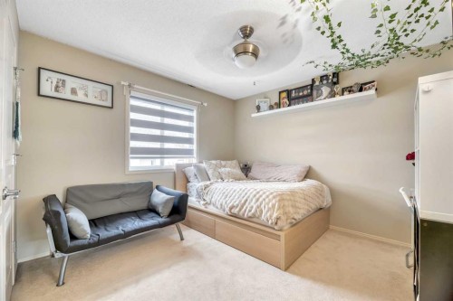 408 Rainbow Falls Way, Chestermere, AB - Indoor Photo Showing Bedroom