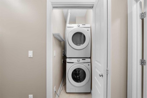 9-181 Rockyledge View Nw, Calgary, AB - Indoor Photo Showing Laundry Room