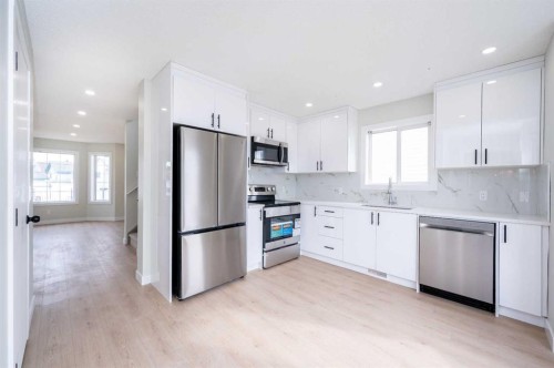 88 Applemont Close Se, Calgary, AB - Indoor Photo Showing Kitchen With Upgraded Kitchen