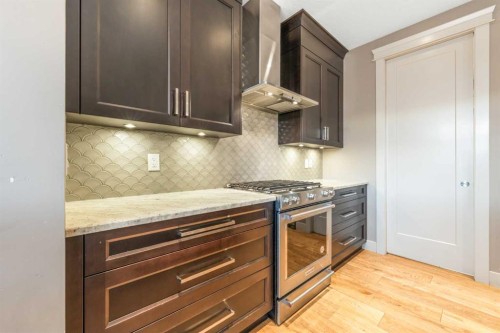 105 Carringvue Manor Nw, Calgary, AB - Indoor Photo Showing Kitchen With Upgraded Kitchen