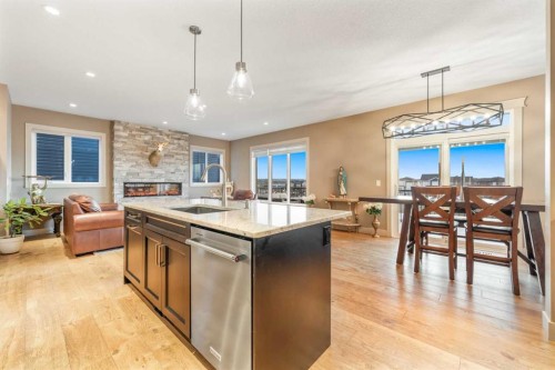 105 Carringvue Manor Nw, Calgary, AB - Indoor With Fireplace