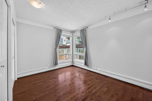 203-644 Meredith Road Ne, Calgary, AB - Indoor Photo Showing Other Room