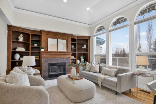 7051 Christie Briar Manor Sw, Calgary, AB - Indoor Photo Showing Living Room With Fireplace