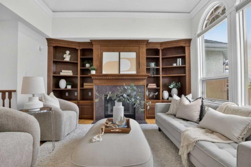 7051 Christie Briar Manor Sw, Calgary, AB - Indoor Photo Showing Living Room With Fireplace