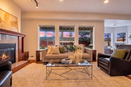 7051 Christie Briar Manor Sw, Calgary, AB - Indoor Photo Showing Living Room With Fireplace