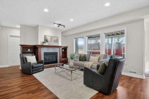 7051 Christie Briar Manor Sw, Calgary, AB - Indoor Photo Showing Living Room With Fireplace
