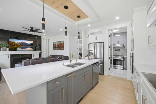 15 Saddlecrest Link Ne, Calgary, AB - Indoor Photo Showing Kitchen With Double Sink With Upgraded Kitchen