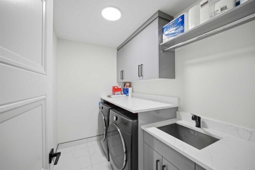 15 Saddlecrest Link Ne, Calgary, AB - Indoor Photo Showing Laundry Room