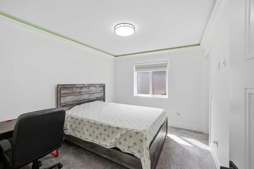 15 Saddlecrest Link Ne, Calgary, AB - Indoor Photo Showing Bedroom