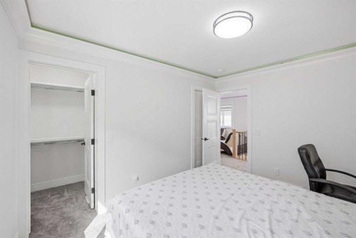 15 Saddlecrest Link Ne, Calgary, AB - Indoor Photo Showing Bedroom
