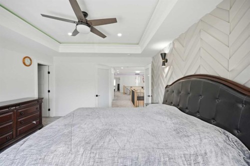 15 Saddlecrest Link Ne, Calgary, AB - Indoor Photo Showing Bedroom