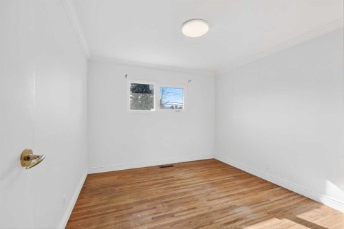 16 Heston Street Nw, Calgary, AB - Indoor Photo Showing Other Room