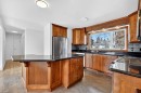 16 Heston Street Nw, Calgary, AB  - Indoor Photo Showing Kitchen 