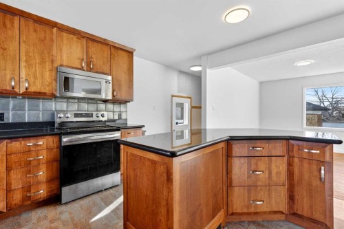 16 Heston Street Nw, Calgary, AB - Indoor Photo Showing Kitchen