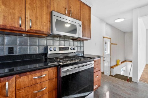 16 Heston Street Nw, Calgary, AB - Indoor Photo Showing Kitchen