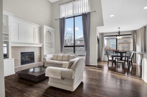 71 Springborough Green Sw, Calgary, AB - Indoor Photo Showing Living Room With Fireplace