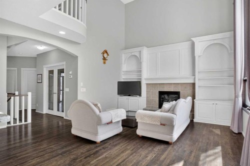 71 Springborough Green Sw, Calgary, AB - Indoor Photo Showing Living Room With Fireplace
