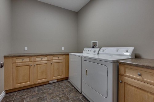 33550 Range Road 23, Rural Mountain View County, AB - Indoor Photo Showing Laundry Room