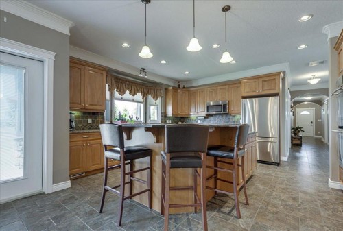 33550 Range Road 23, Rural Mountain View County, AB - Indoor Photo Showing Kitchen