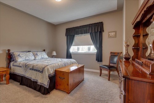 33550 Range Road 23, Rural Mountain View County, AB - Indoor Photo Showing Bedroom