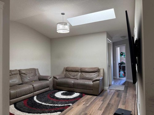 21 Red Embers Common Ne, Calgary, AB - Indoor Photo Showing Living Room