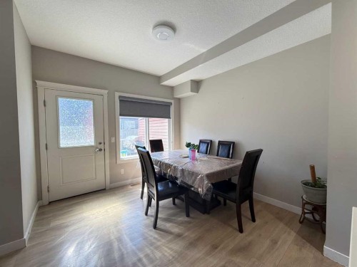 21 Red Embers Common Ne, Calgary, AB - Indoor Photo Showing Dining Room