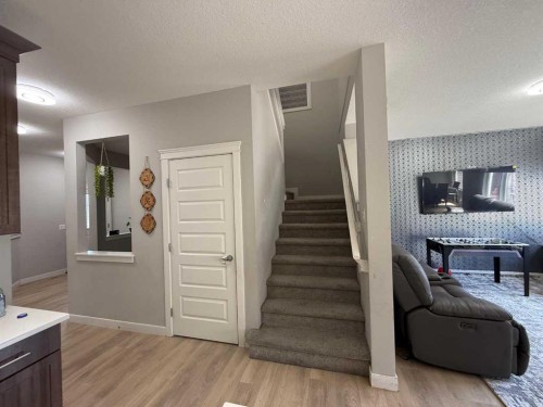 21 Red Embers Common Ne, Calgary, AB - Indoor Photo Showing Other Room