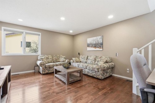 330 Silver Ridge Crescent Nw, Calgary, AB - Indoor Photo Showing Living Room