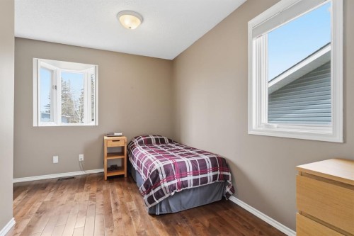 330 Silver Ridge Crescent Nw, Calgary, AB - Indoor Photo Showing Bedroom