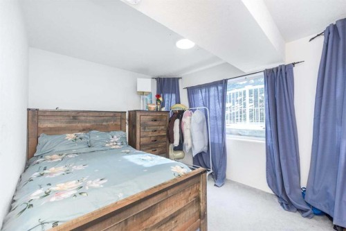 230 Sierra Nevada Place Sw, Calgary, AB - Indoor Photo Showing Bedroom