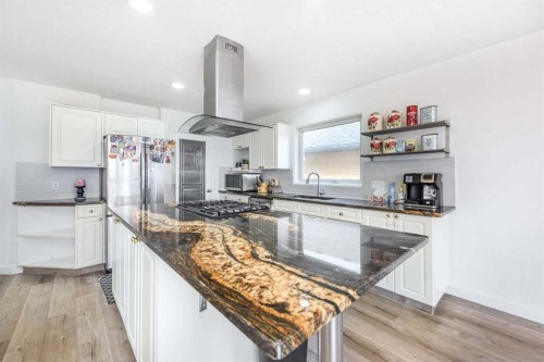 230 Sierra Nevada Place Sw, Calgary, AB - Indoor Photo Showing Kitchen With Upgraded Kitchen