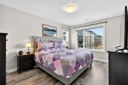 305 Seton Circle Se, Calgary, AB - Indoor Photo Showing Bedroom