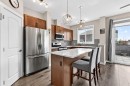 305 Seton Circle Se, Calgary, AB  - Indoor Photo Showing Kitchen With Stainless Steel Kitchen With Upgraded Kitchen 