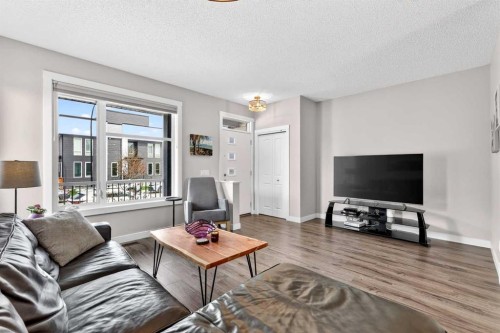 305 Seton Circle Se, Calgary, AB - Indoor Photo Showing Living Room