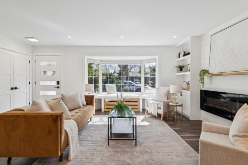 175 Havenhurst Crescent Sw, Calgary, AB - Indoor Photo Showing Living Room With Fireplace
