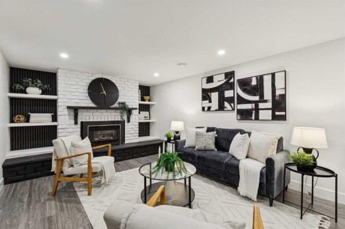175 Havenhurst Crescent Sw, Calgary, AB - Indoor Photo Showing Living Room With Fireplace