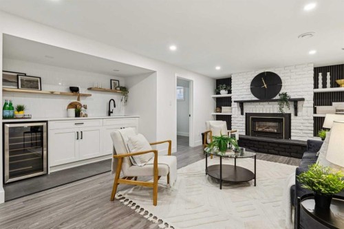 175 Havenhurst Crescent Sw, Calgary, AB - Indoor Photo Showing Living Room With Fireplace