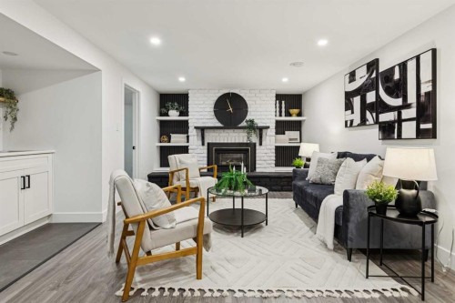 175 Havenhurst Crescent Sw, Calgary, AB - Indoor Photo Showing Living Room With Fireplace