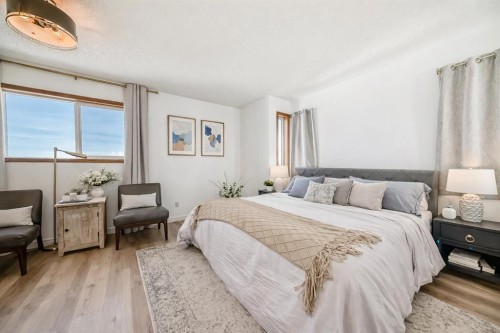 110 Erin Meadow Close Se, Calgary, AB - Indoor Photo Showing Bedroom