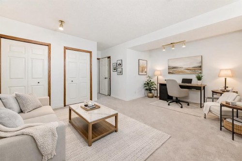 110 Erin Meadow Close Se, Calgary, AB - Indoor Photo Showing Living Room