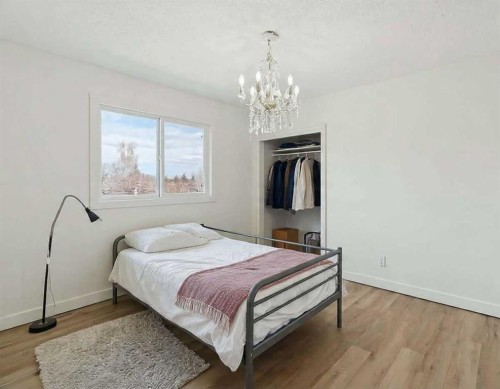 214 Springwood Place Sw, Calgary, AB - Indoor Photo Showing Bedroom