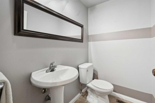 214 Springwood Place Sw, Calgary, AB - Indoor Photo Showing Bathroom